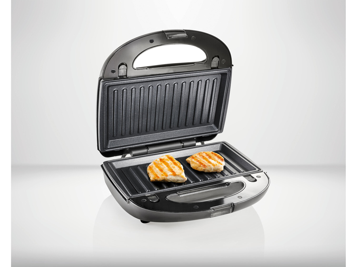 Opiekacz 3 w 1, 750 W Silverscrest Kitchen Tools, cena 79,90 PLN
- wymienne płyty ...